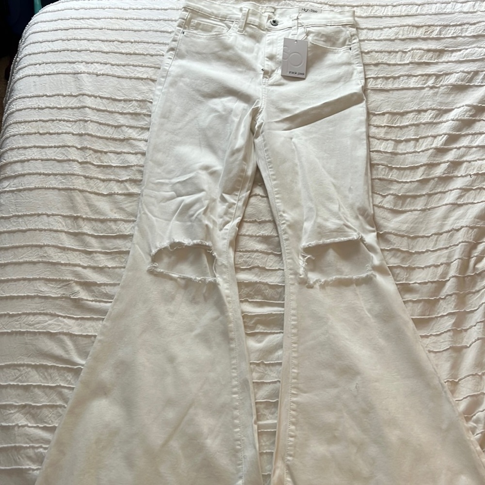 White distressed flares